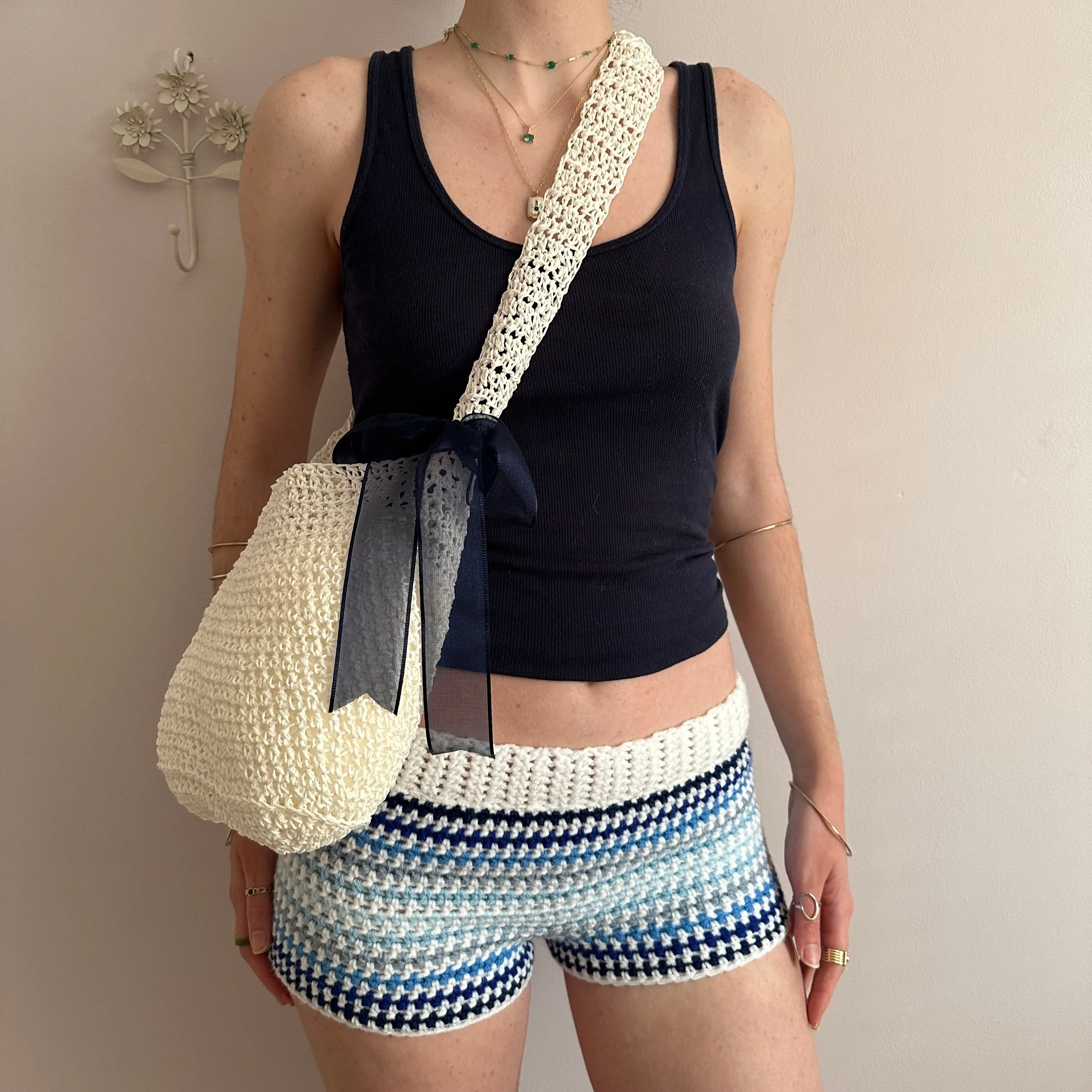 Handmade cream crochet straw bag with navy blue bow - can also be worn crossbody